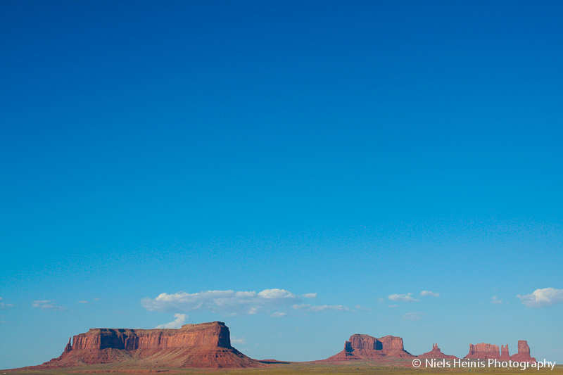 Monument valley under a blue sky